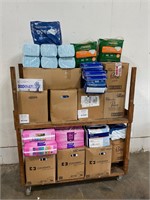 Cart Full of New Adult Diapers and Potty Pads