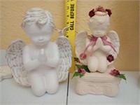 2 praying cherubs. Smaller one has a music box