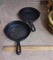 Duo of 6 inch cast iron skillets. One is Classic,