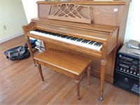 Baldwin Aerosonic piano with matching bench.