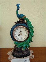 Super cute resin peacock clock. Approx 13 inches