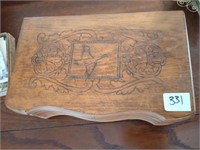 Wonderful wooden jewelry box with a carved top.