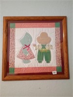 Framed quilted picture. Approx 21 3/4 inches tall