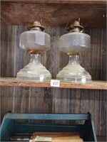 Duo of oil lamps