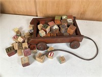 Vintage Children’s pull cart with blocks
