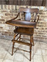 Vintage child’s high chair with tray