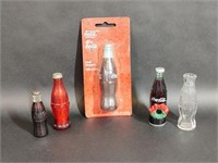 Five Miniature Coca-Cola Bottles