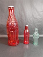 Two Red Coca-Cola Banks & One Clear Bank
