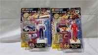 2 new sealed racing figures