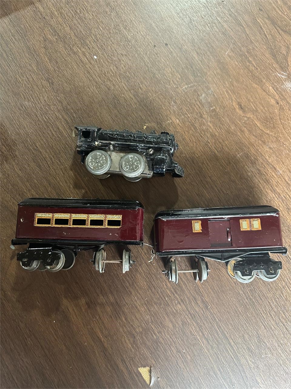 Vintage cast iron engine and tin cars