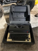 Vintage Olympia Type Writer with carry case