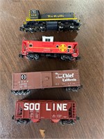 S scale engine and 3 cars