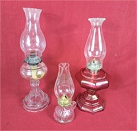 Pair of oil lamps and 1 Finger oil lamp