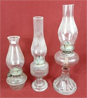 Trio of oil lamps