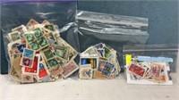 Three Ziploc Bags Containing World Stamps
