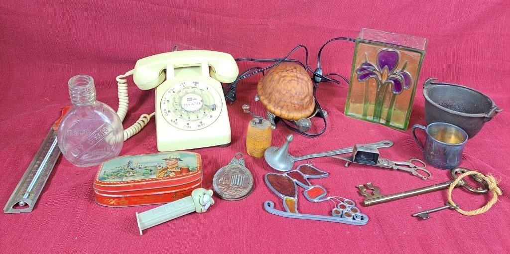 Feeding My Own bottle, rotary telephone, keys,