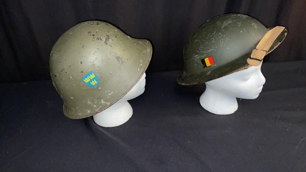 2 WW II German Military Helmets