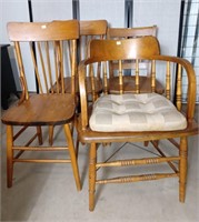 4 Wood Chairs in good condition.1 is a Dominion