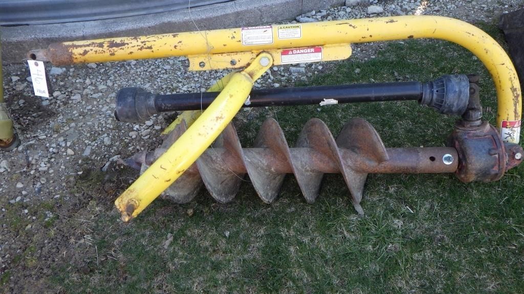 Yellow Post hole auger PTO  appr12" auger