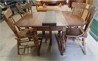 Wooden Dining table with 4 chairs.