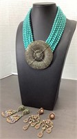 Heidi Daus rhinestone medallion with turquoise