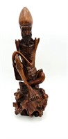 A Large Japanese Carved Boxwood Okimono of Rakan