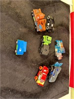 SIX PLASTIC CARS & TRUCKS