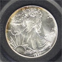 US Coins 1987 Silver Eagle, Uncirculated with some