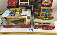 Large assortment of frames, puzzles, games and