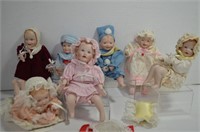 Seven Aston Drake Miniature Porcelain Dolls