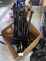 BOX OF CURTAIN RODS