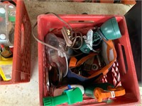 red crate of clip light, yard, and tools