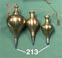 Three brass English-style plumb bobs