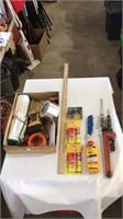 Screwdrivers, pipe wrench, super glue, box