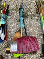 lot of tools, snow shovel brooms, etc.