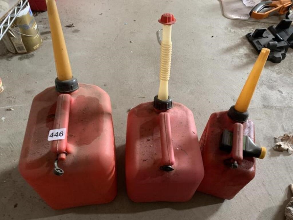 THREE GAS CANS