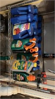 Shelf of assorted lawn care items