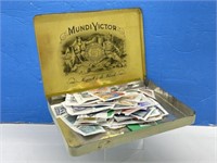 Mundi Victor Tin With Stamps