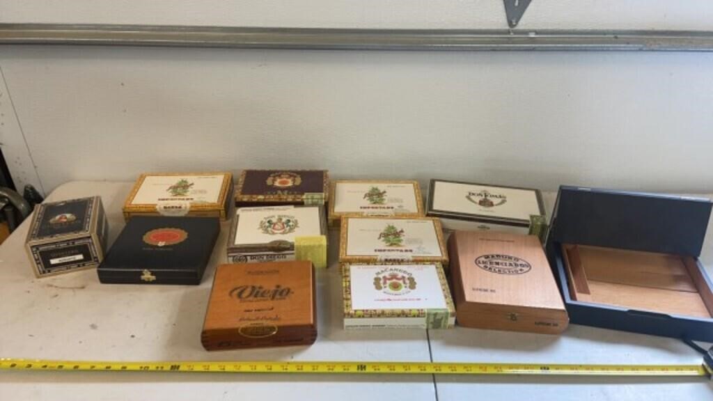 Cigar boxes including wooden boxes