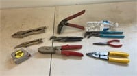 Tools, vice grips, tape, pliers ,