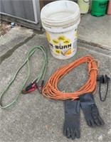 Extension cord , jumper cables tall bucket, boat