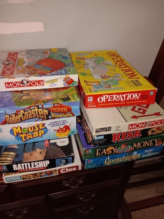 Stack of different games. Monopoly Risk and more.