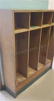 Coat cubbies. 57×52½×12½. Attached to wall. Buyer