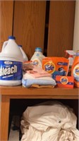 Tide detergent, bleach, microfiber cloths, sheets