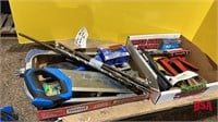 Box of staplers, staples, saws, wood bits, etc.