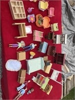 Large amount of dollhouse furniture and figurines
