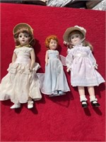 Three old dolls