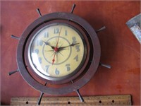 Ship wheel clock-small scratch on lens