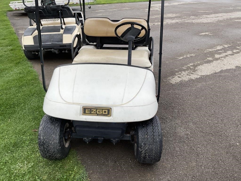 White EZGO golf cart gas powered original stock