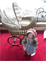 Wicker doll buggy with dolls